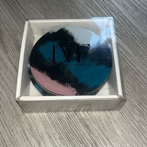 Diane Von Furstenburg glass coaster